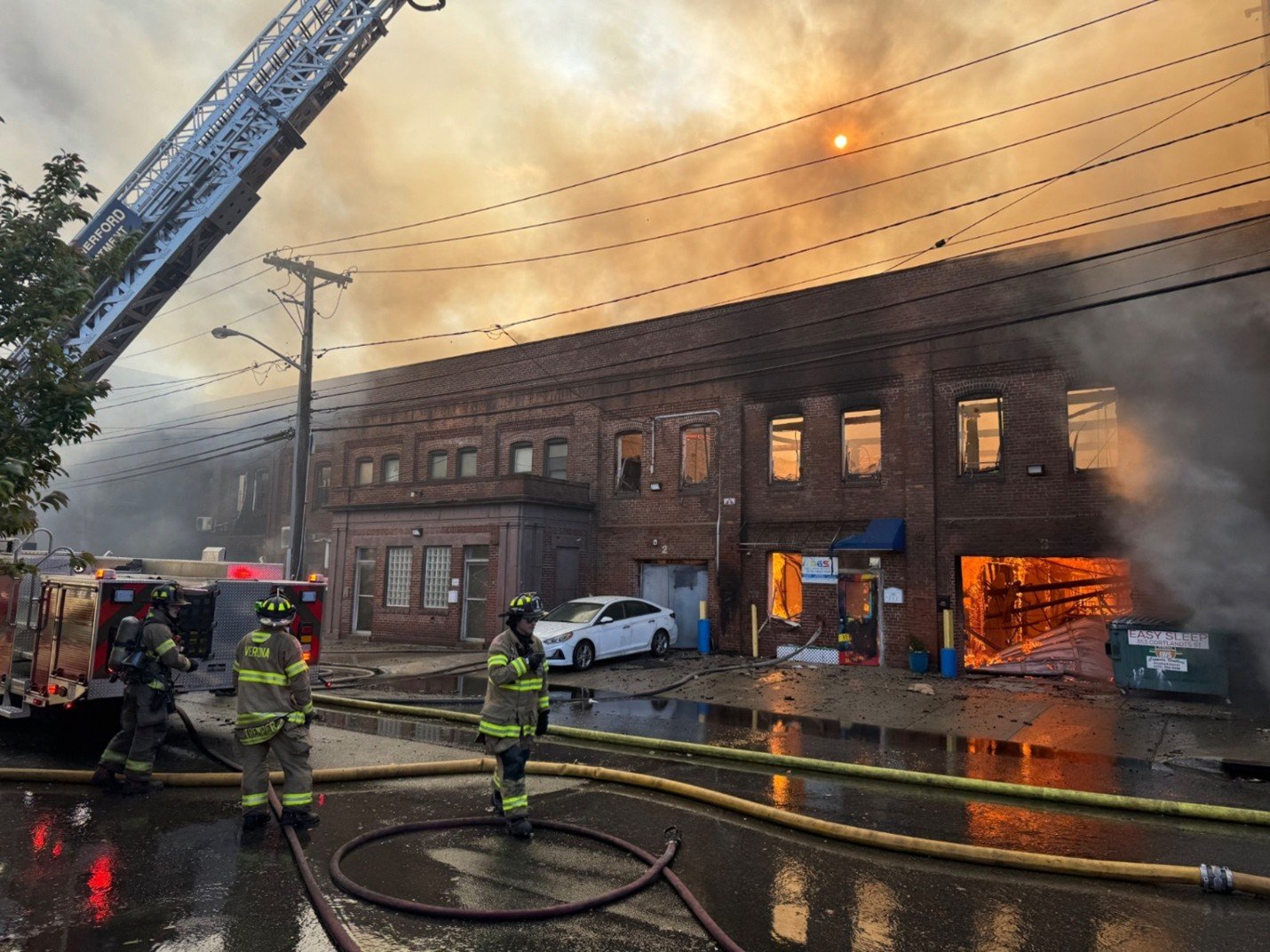 Commercial mattress warehouse fire consumes entire block in Belleville, New Jersey