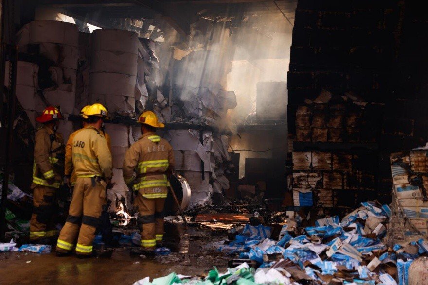Crews investigate hot spots in a fire