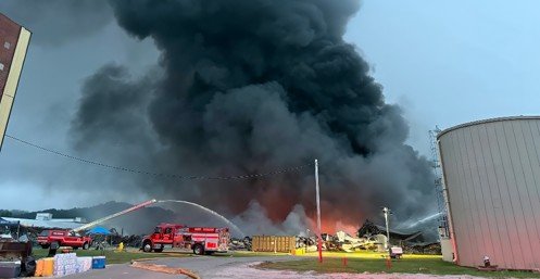 black smoke billowing from fire