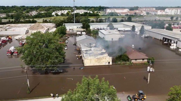 flood waters surrounding businesses