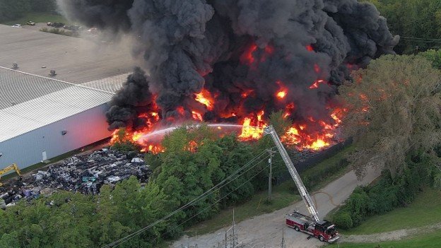 Heavy fire and smoke engulfing the South Haven plastics plant facility.