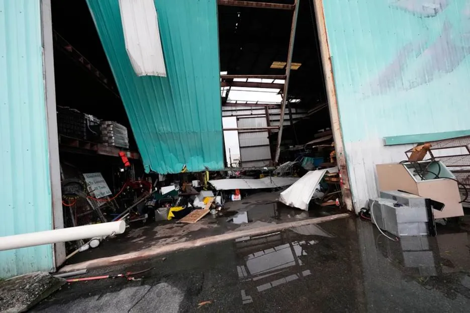 Wind damage to a commercial warehouse in Destin, Florida following Hurricane Isaias
